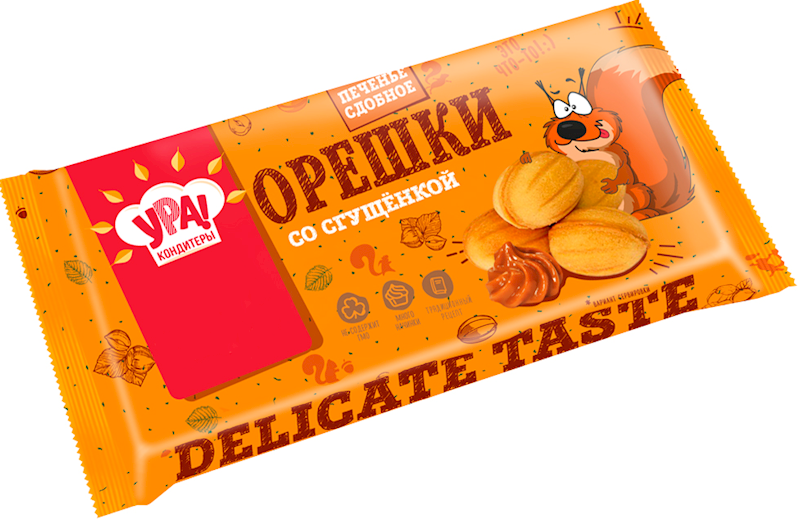 Packaging of Oreshki cookies with condensed milk showing the product and brand name, Ura, with a cartoon squirrel on the front.